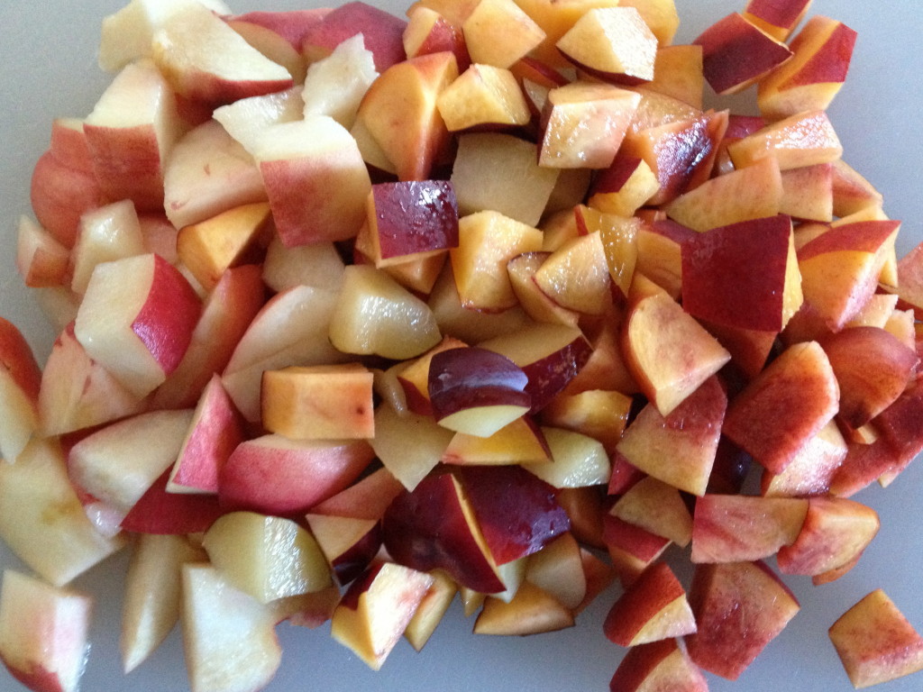 Chopped nectarine, plum and peach to make into a stone fruit baby food puree.