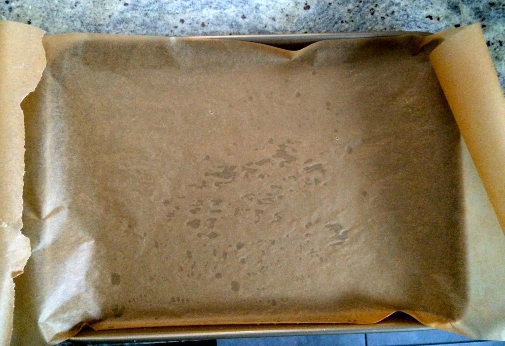 The secret to keeping parchment paper in place? A little water underneath it.
