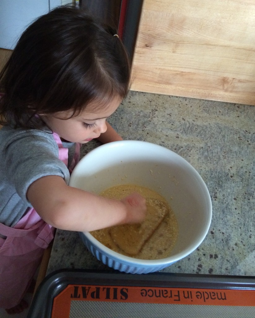 Dipping the bread for Coconut French Toast from teeny tiny foodie