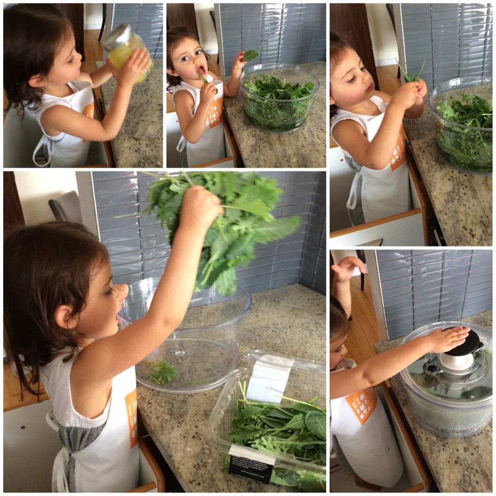 My toddler helping to prepare Shaved Apple & Baby Kale Salad from teeny tiny foodie