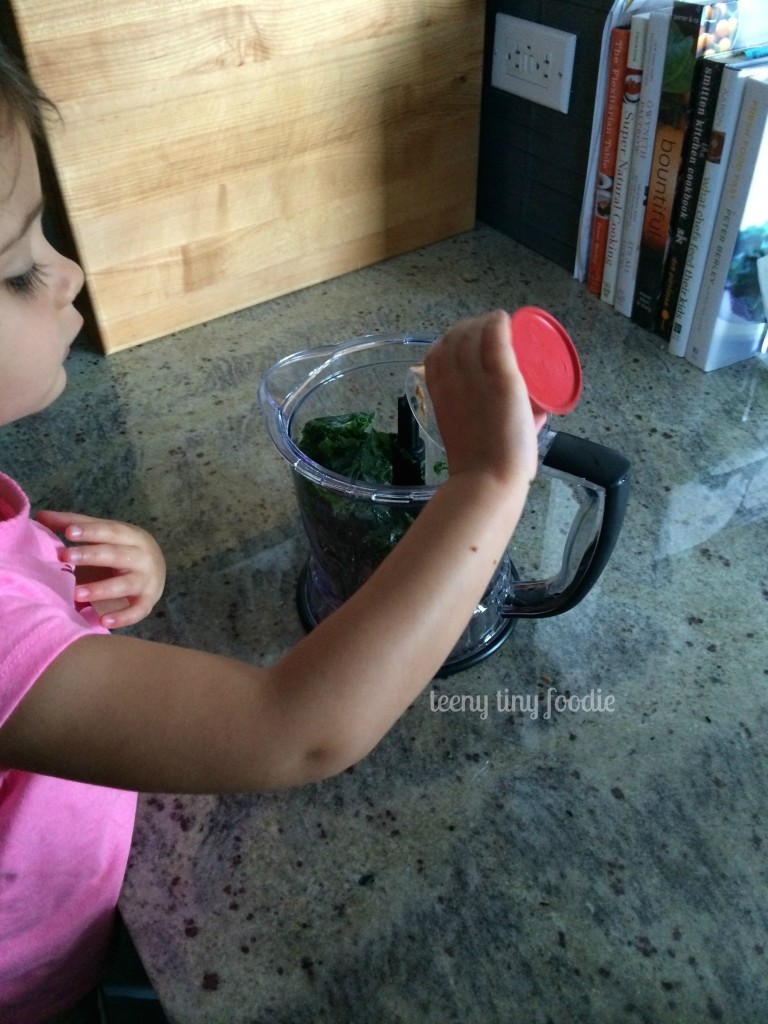 Adding coconut water to a Nutty Green Smoothie from teeny tiny foodie