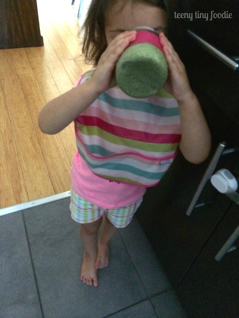 Enjoying her Nutty Green Smoothie from teeny tiny foodie