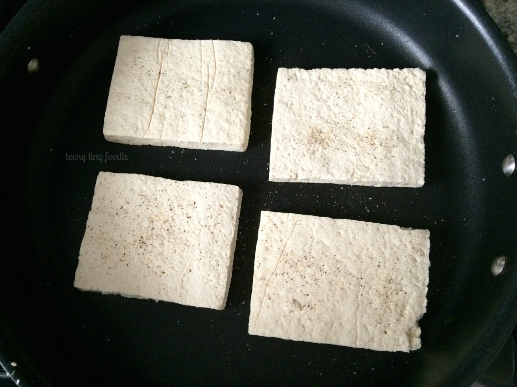 Searing tofu for Cracker Jack Quinoa from teeny tiny foodie