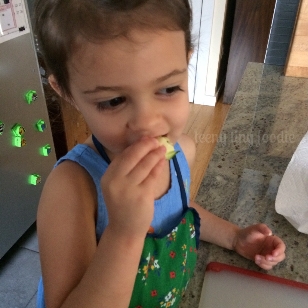 Eliana took a break to snack on some of the raw zucchini while we cooked. from teeny tiny foodie