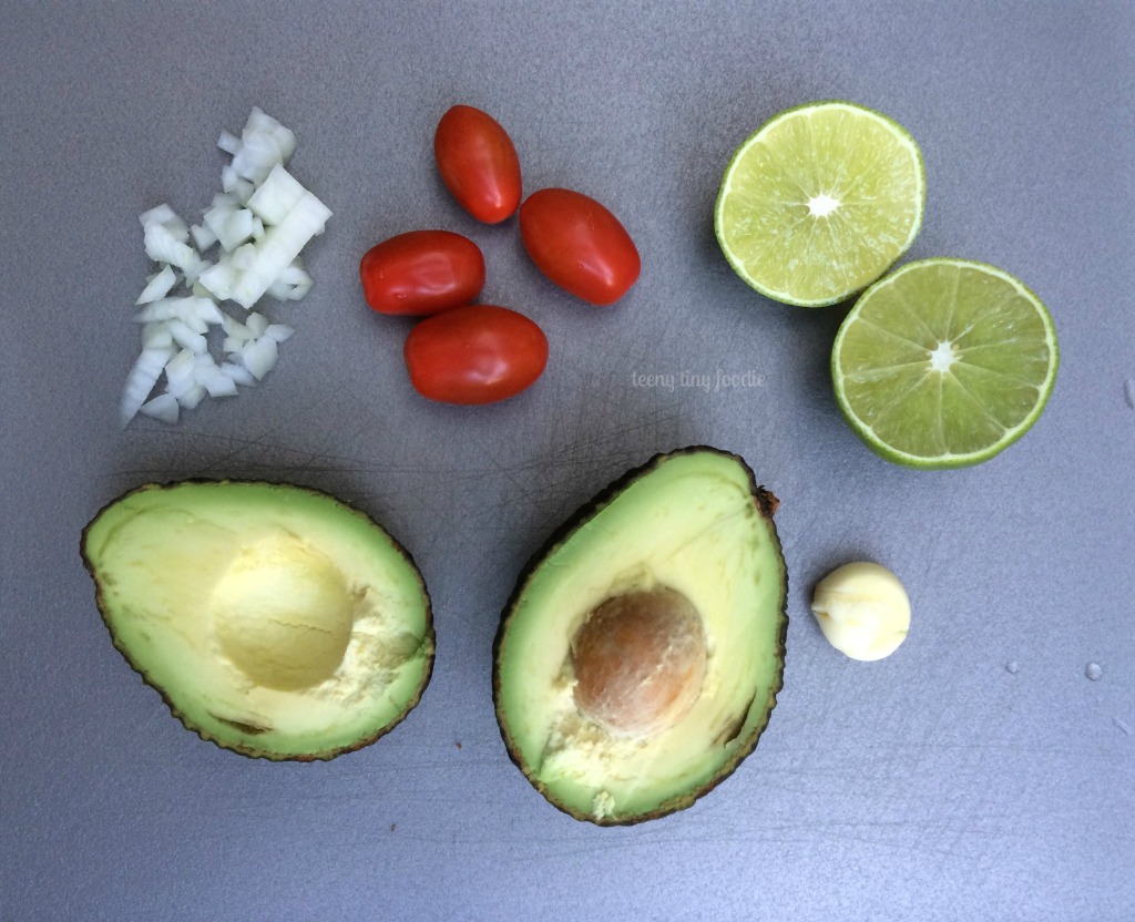 Homemade #guacamole is a #healthy and #delicious snack that kids can help make. It's so tasty they won't even realize they are eating their vegetables! recipe from teeny tiny foodie #kidsinthekitchen #KidsCookMonday